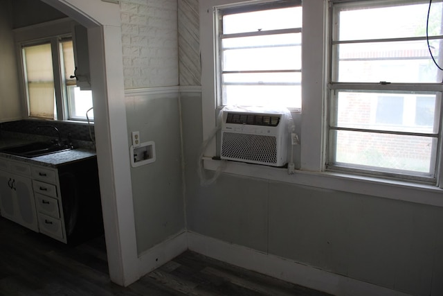 1002 Broadway St, Ballinger, TX 76821 - bathroom with wood finished floors, healthy amount of natural light, and vanity