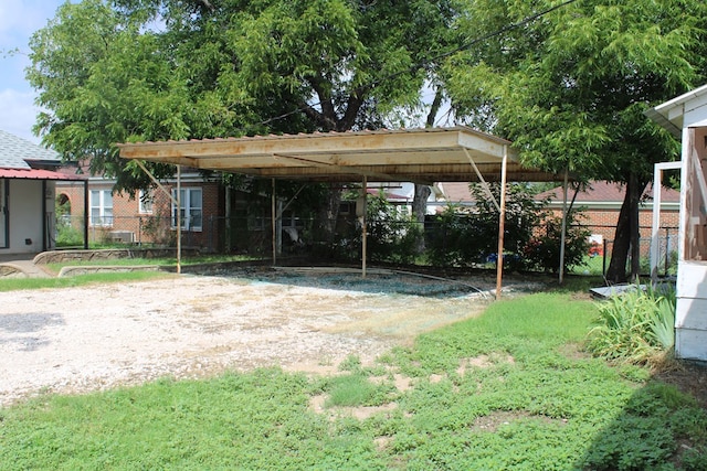 1002 Broadway St, Ballinger, TX 76821 - view of yard with dirt driveway