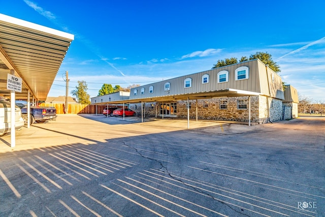 exterior space featuring a carport