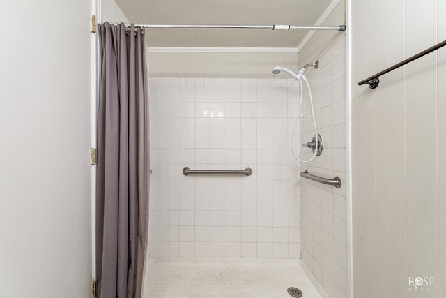 bathroom with a shower with curtain