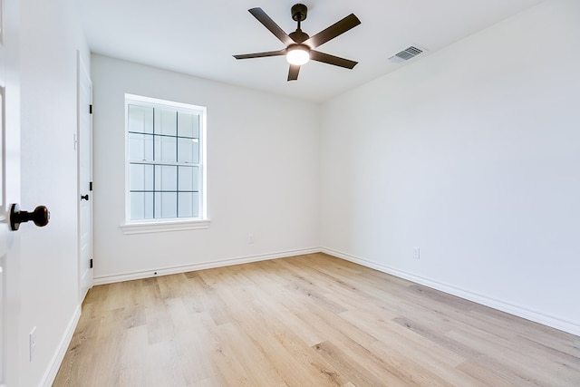 unfurnished room featuring ceiling fan and light hardwood / wood-style flooring