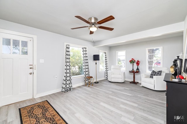 entryway featuring ceiling fan and light hardwood / wood-style flooring