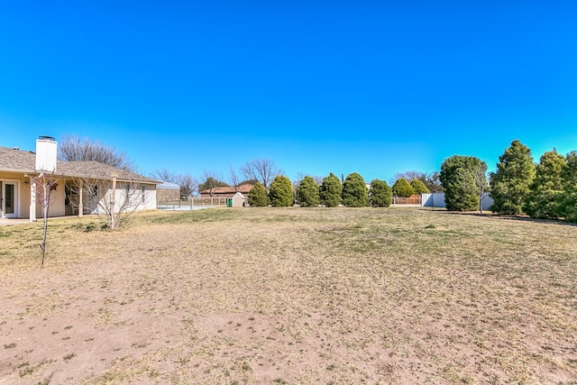 view of yard featuring fence