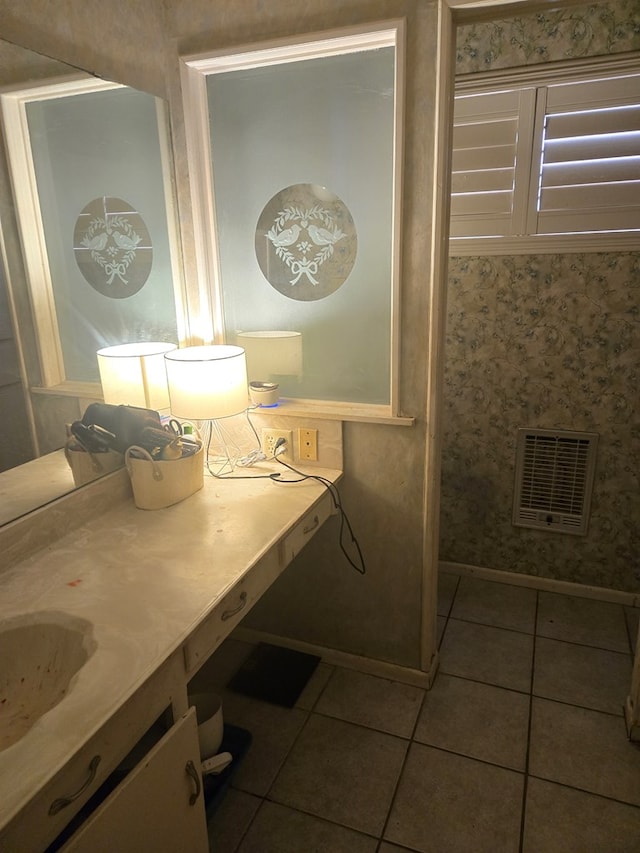 bathroom with vanity, visible vents, and tile patterned floors