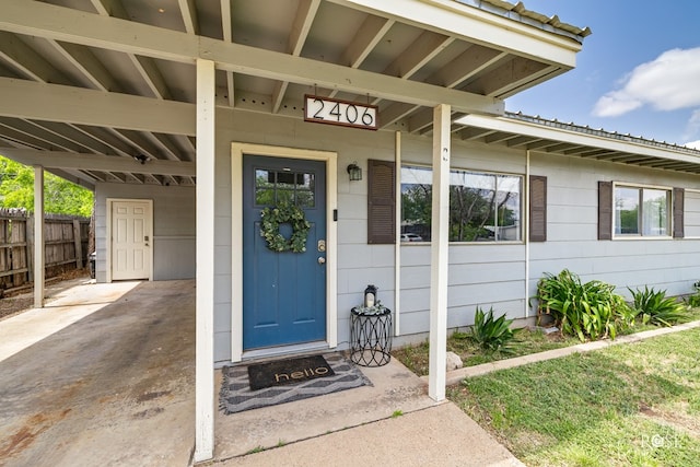 property entrance with fence