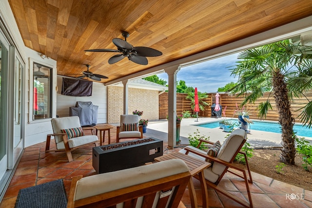 3110 Palo Duro Dr, San Angelo, TX 76904 - fenced backyard featuring a fire pit, a patio, and ceiling fan