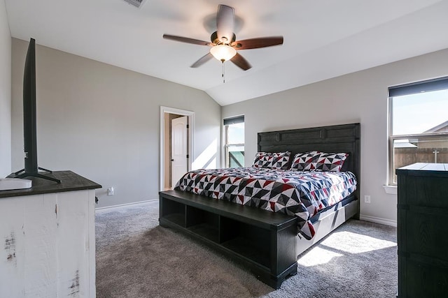 carpeted bedroom featuring lofted ceiling and ceiling fan