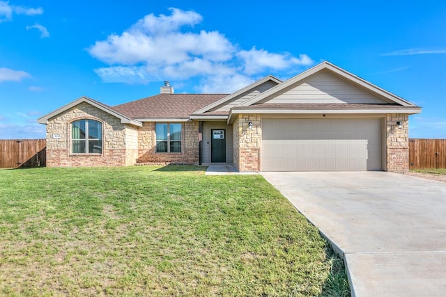 single story home featuring a garage and a front yard