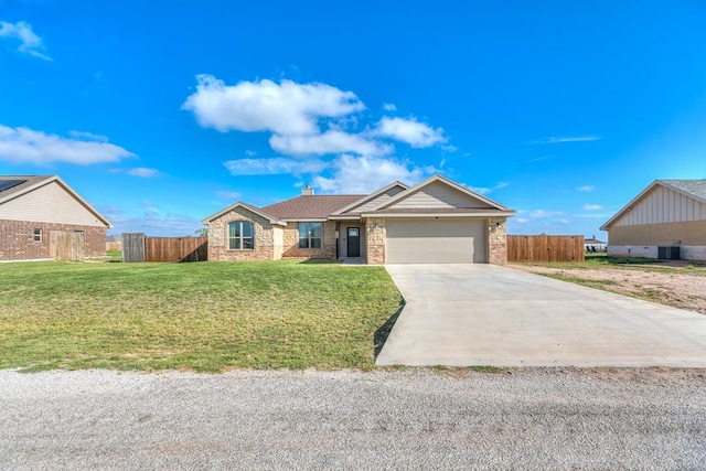 ranch-style house with a garage and a front yard