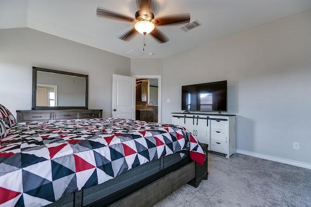 bedroom with light carpet, vaulted ceiling, and ceiling fan