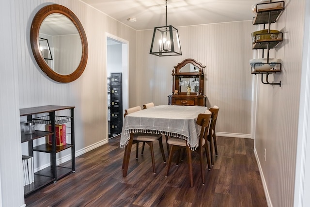 dining space with dark wood-type flooring