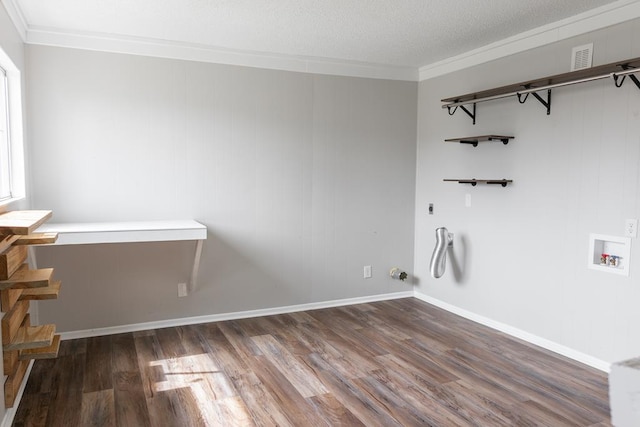 washroom featuring washer hookup, wood finished floors, laundry area, and crown molding