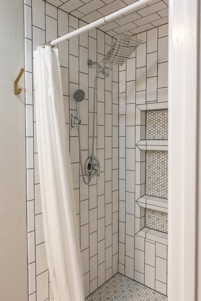 full bathroom featuring a stall shower