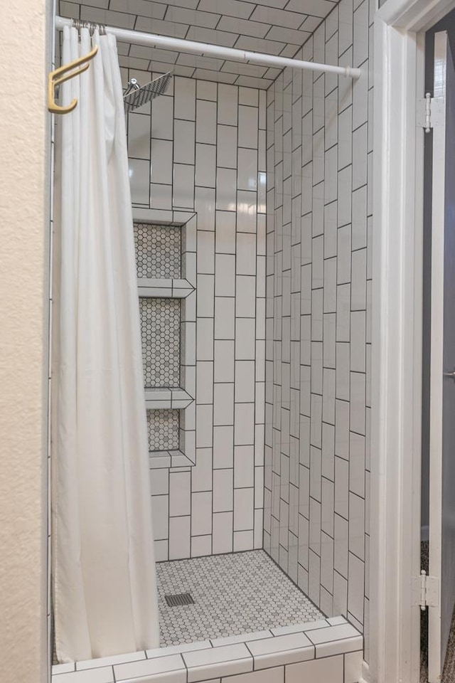 full bathroom with a stall shower