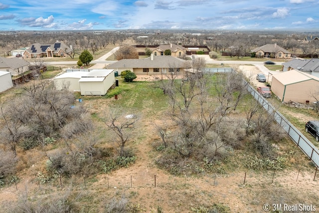 drone / aerial view with a residential view