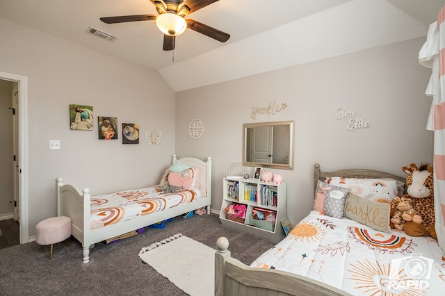 bedroom with baseboards, visible vents, carpet floors, and lofted ceiling