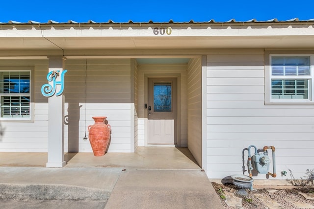 entrance to property with a porch