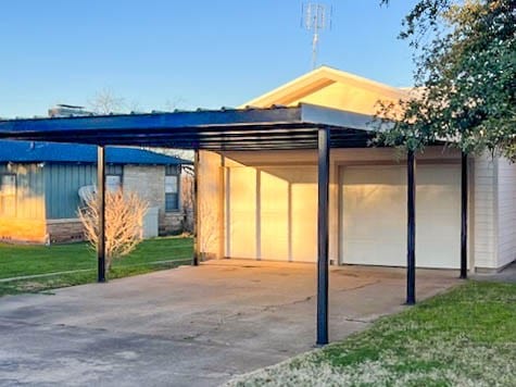 exterior space with a carport