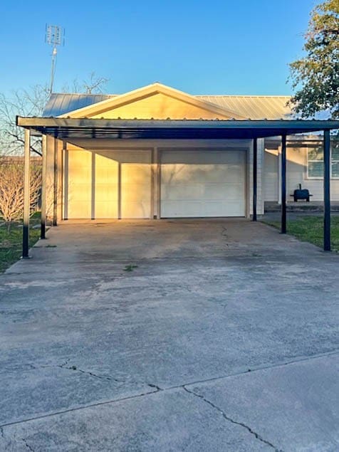 view of front of property with a carport