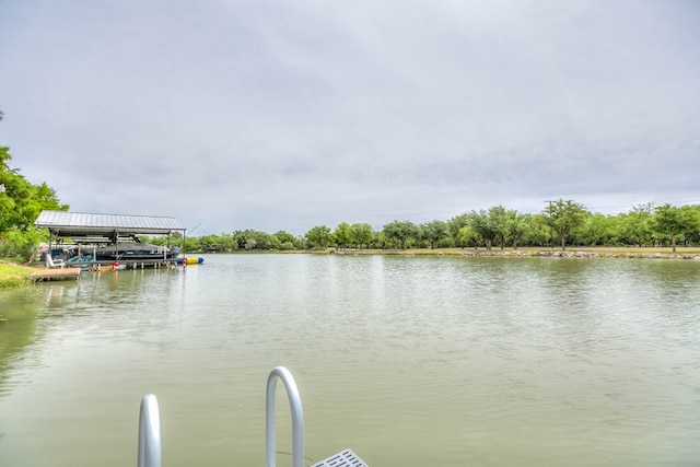 view of water feature with a dock