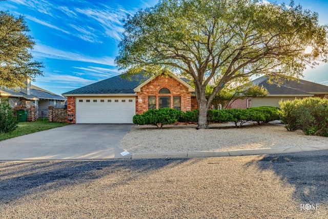 single story home with a garage