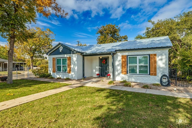 ranch-style home with a front yard