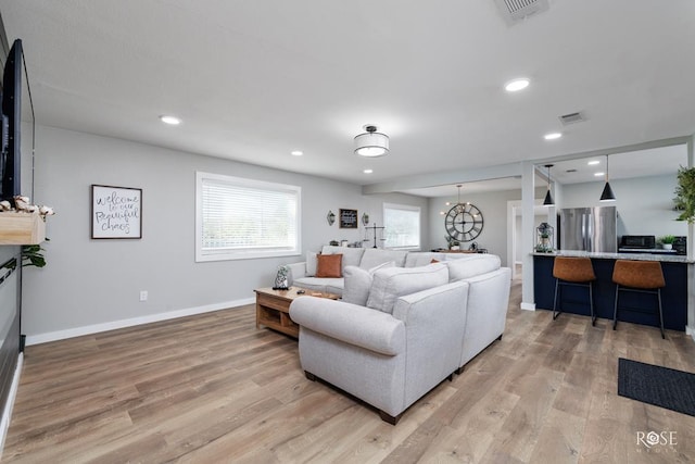 living room featuring light hardwood / wood-style flooring