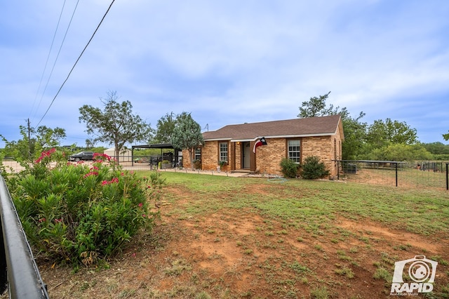 view of front of home with a front lawn