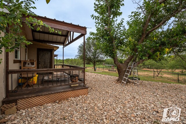 view of yard with a deck