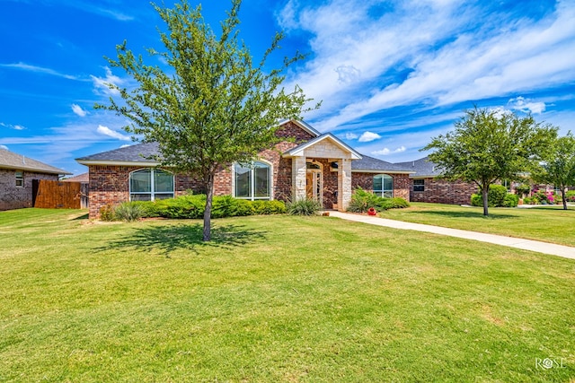 view of front of house with a front lawn