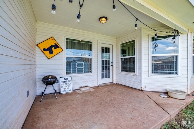 doorway to property featuring a patio