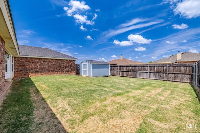 view of yard with a storage shed