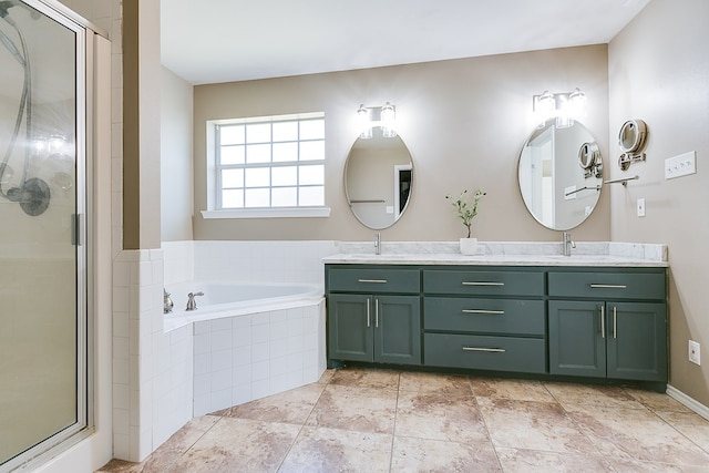 bathroom featuring vanity and plus walk in shower