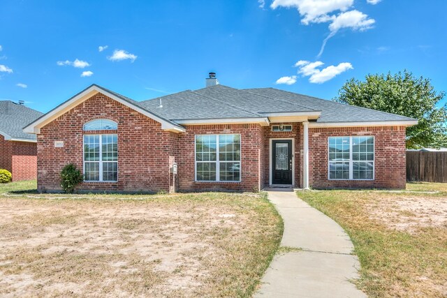 view of front of house with a front yard