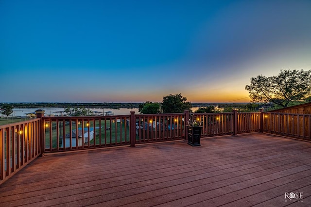 deck at dusk with a water view