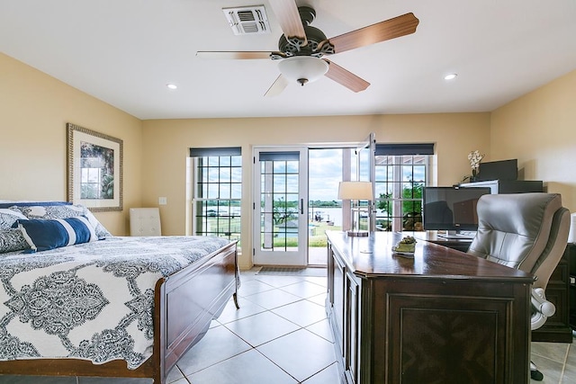 bedroom featuring light tile patterned flooring, ceiling fan, and access to outside