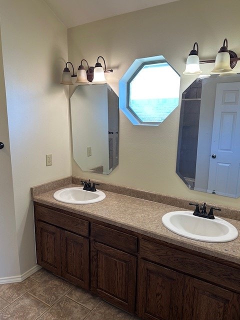 bathroom featuring vanity and tile patterned flooring