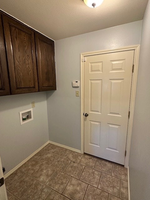 laundry room with cabinets and hookup for a washing machine