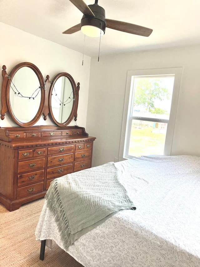 1702 Ellis St, San Angelo, TX 76905 - bedroom with light carpet and ceiling fan