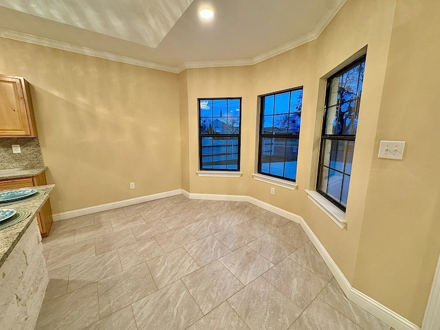 interior space with crown molding