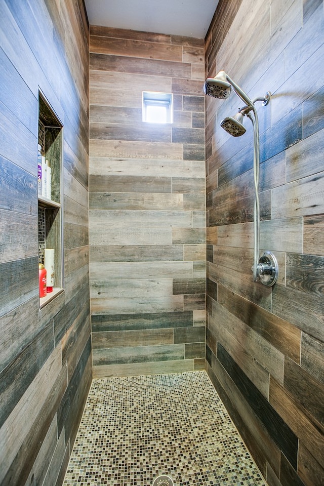 2118 Valleyview Dr, San Angelo, TX 76904 - full bath featuring a tile shower and wooden walls