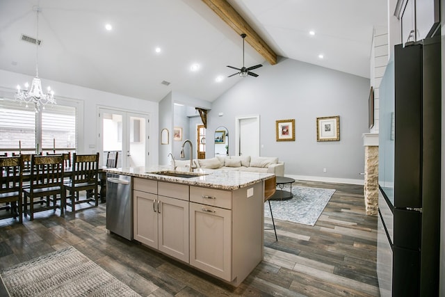 2118 Valleyview Dr, San Angelo, TX 76904 - kitchen featuring dishwasher, open floor plan, beam ceiling, high vaulted ceiling, and a center island with sink