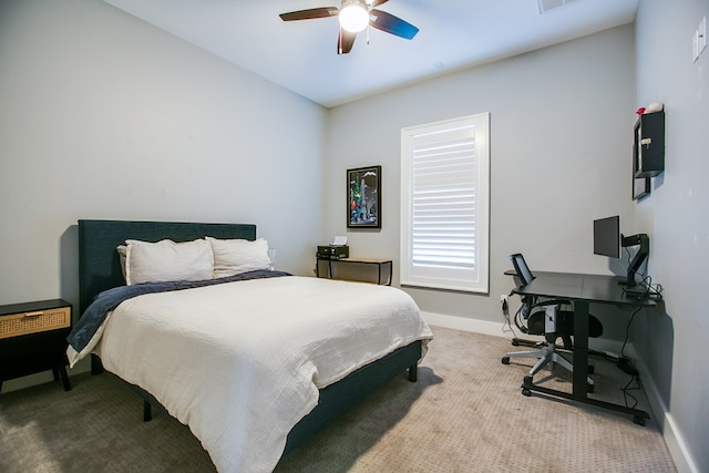 2118 Valleyview Dr, San Angelo, TX 76904 - bedroom featuring light colored carpet, a desk, and ceiling fan