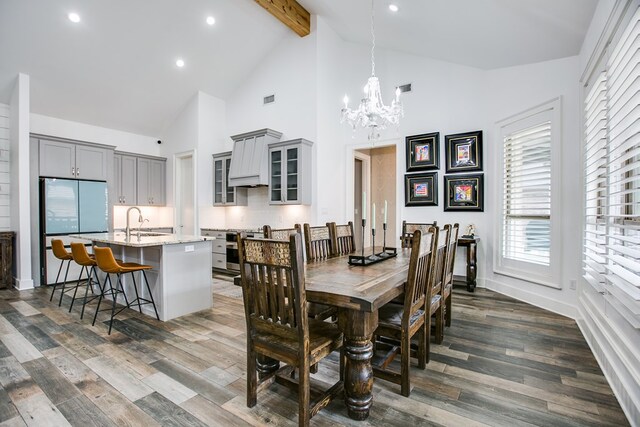 2118 Valleyview Dr, San Angelo, TX 76904 - dining space with a chandelier, high vaulted ceiling, beamed ceiling, dark wood-type flooring, and recessed lighting