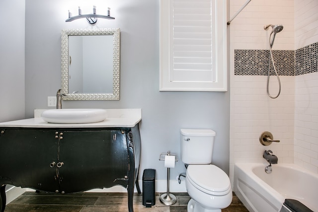 2118 Valleyview Dr, San Angelo, TX 76904 - full bath with vanity, tub / shower combination, and wood finished floors