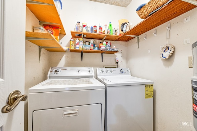 washroom featuring washing machine and dryer