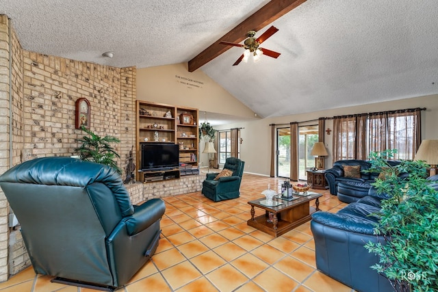 living room featuring ceiling fan, light tile patterned floors, a textured ceiling, and beam ceiling