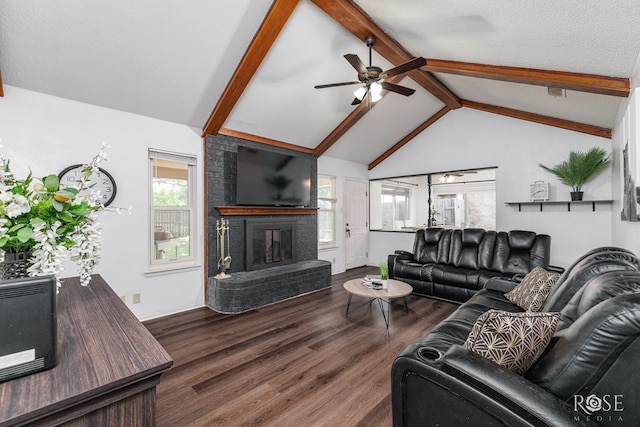 2509 1st Atlas St, San Angelo, TX 76905 - living room with ceiling fan, a fireplace, and wood finished floors