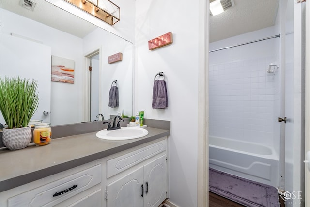 2509 1st Atlas St, San Angelo, TX 76905 - full bathroom with vanity and tub / shower combination