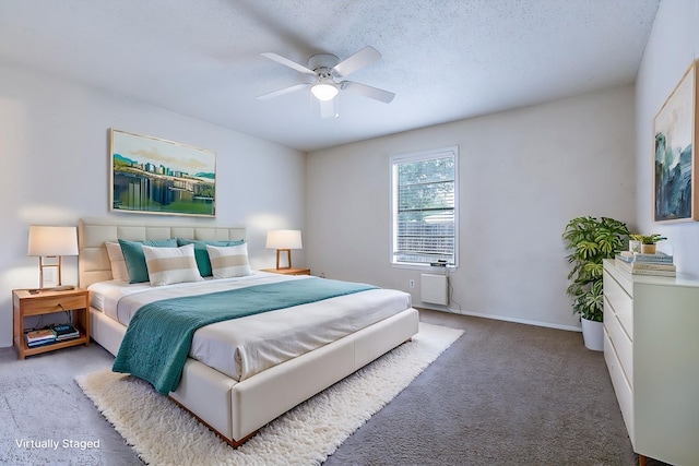 1826 High Butte Dr, San Angelo, TX 76905 - carpeted bedroom featuring a ceiling fan and baseboards